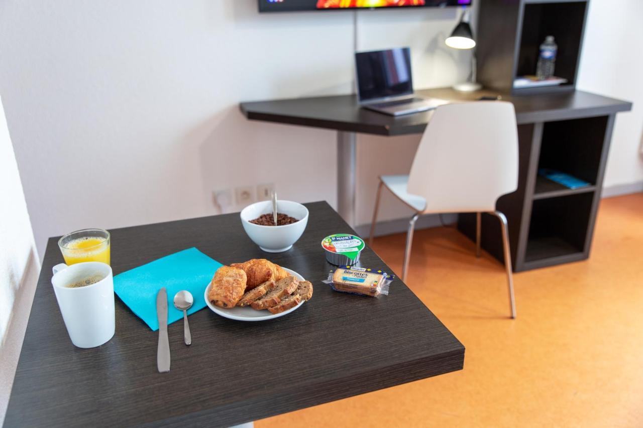 Comfort Aparthotel Besancon Hauts Du Chazal Bagian luar foto