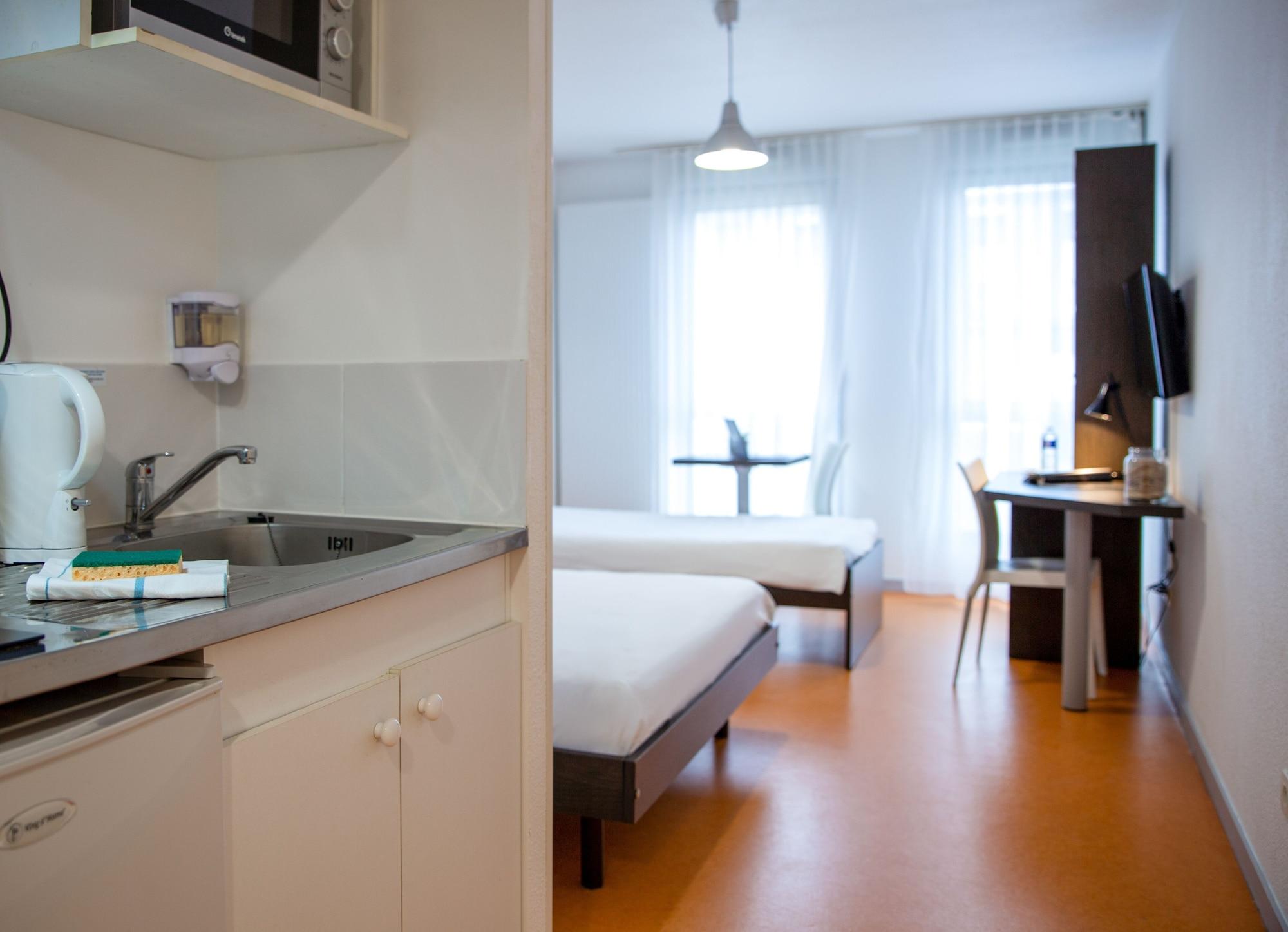 Comfort Aparthotel Besancon Hauts Du Chazal Bagian luar foto