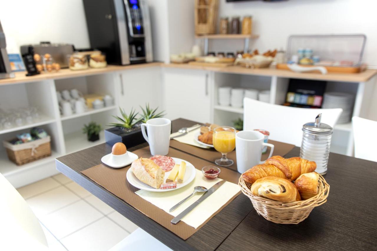 Comfort Aparthotel Besancon Hauts Du Chazal Bagian luar foto
